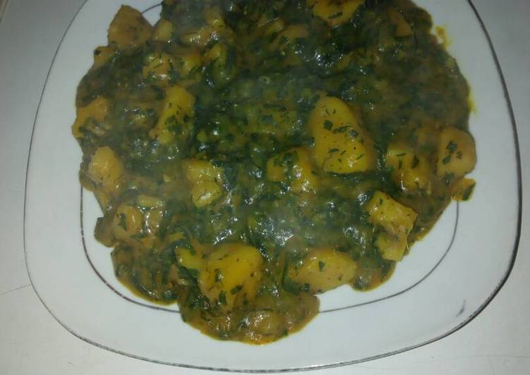 Step-by-Step Guide to Prepare Favorite Yam porriage with ugu and uziza leaves