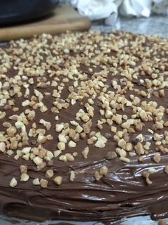 Una foto de Tarta de obleas con Nutella y almendras😋