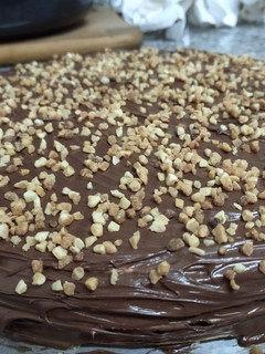 Una foto de Tarta de obleas con Nutella y almendras😋