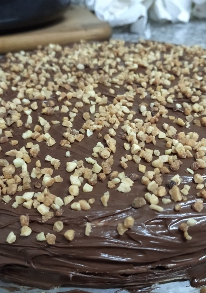 Una foto de Tarta de obleas con Nutella y almendras😋
