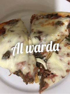 صورة لوصفة بيتزا بالخضار