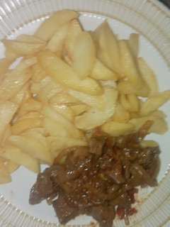 A picture of Fried Potatoes with Liver Sauce.