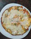 Tortilla de zanahoria y tomate con queso.