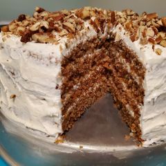 A picture of Carrot cake with cream cheese icing.