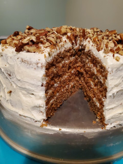 A picture of Carrot cake with cream cheese icing.