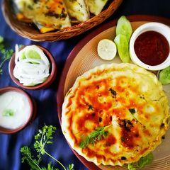 A picture of Qeema Stuffed Pizza Naan.