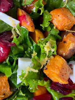 A picture of Sweet Potato, Plum and Kale Salad - can be vegan.