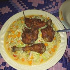 A picture of Indomie noodles with veggies.