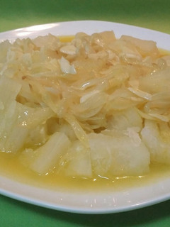 Una foto de Yuca en mojo criollo
