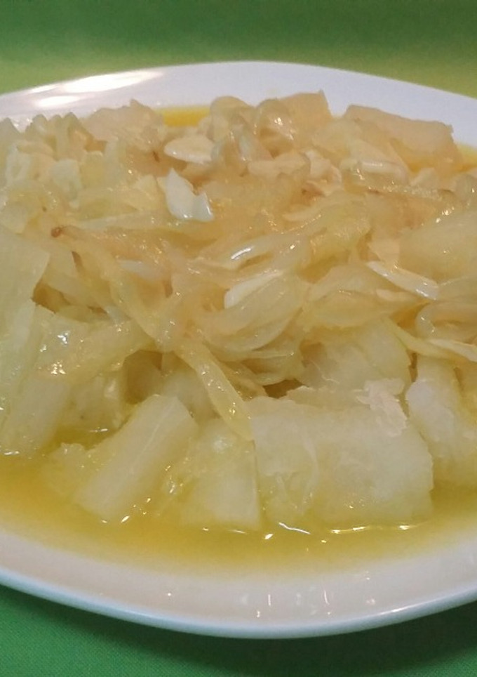 Una foto de Yuca en mojo criollo