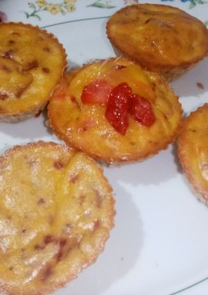 O poză a rețetei Brioșe de mango cu căpșuni.