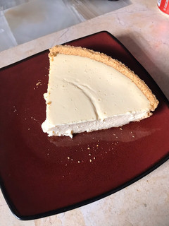Una foto de Pay de queso con mango
