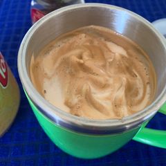 A picture of Cappuchino coffee without coffee machine.