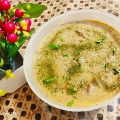 A picture of Kofta in white gravy.