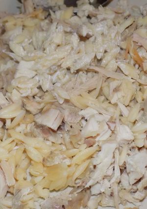 Una foto de Riso con pollo desmenuzado