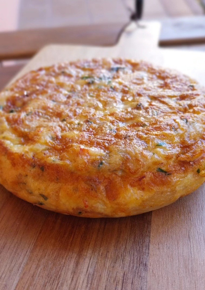 Una foto de Tortilla de patatas y gambas