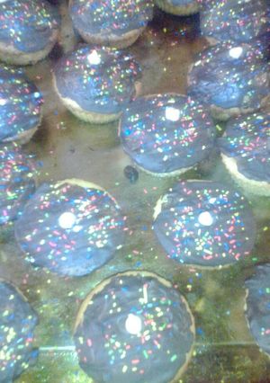 Una foto de Cupcakes bañados en chocolate