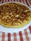 Tortilla de manzanas con cebolla