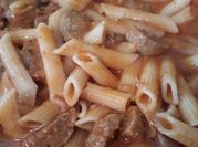 A picture of spaghetti sauce with meatballs