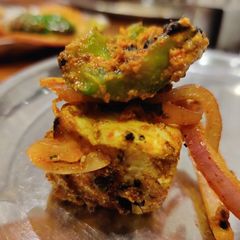 A picture of Spicy paneer in tawa.