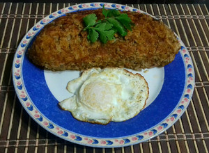 Una foto de Tacu tacu de Arroz con Lentejas