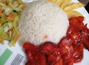 Una foto de Costilla ahumada con Coca-Cola