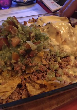 A picture of Nachos with Ground Beef, Cheeses, and Guacamole.