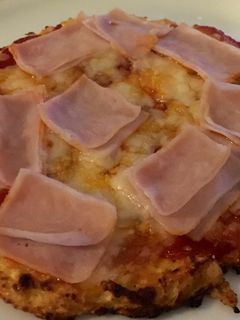 Una foto de Pizza con masa de coliflor