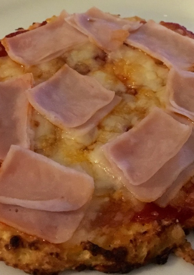 Una foto de Pizza con masa de coliflor