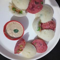 A picture of Vegetables filled Rava idli.
