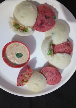 A picture of Vegetables filled Rava idli.