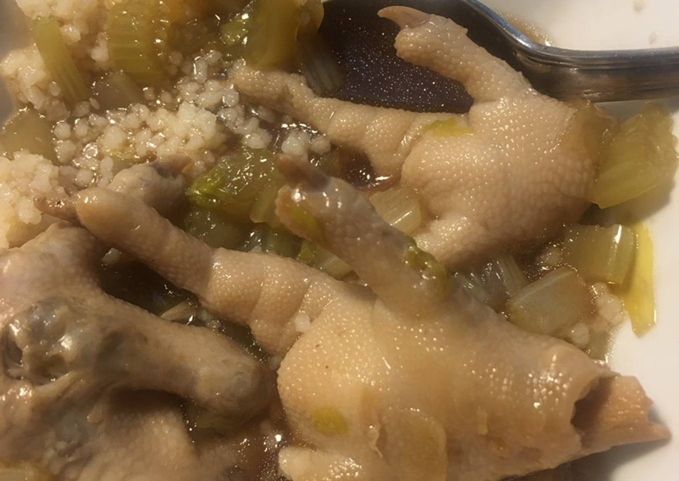 Chicken leg soup with peanuts and celery