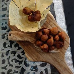 A picture of Jaggery fritters (gulgule).