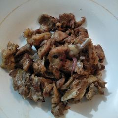 A picture of Fried goat meat.