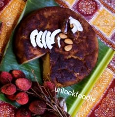 A picture of KAKHARU PODA PITHA (pumpkin cake).