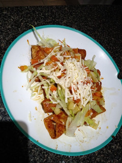 A picture of Tacos Rojos (Potosino Tacos or Camila Tacos).