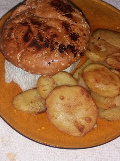 Una foto de Hamburguesa con cebolla caramelizada
