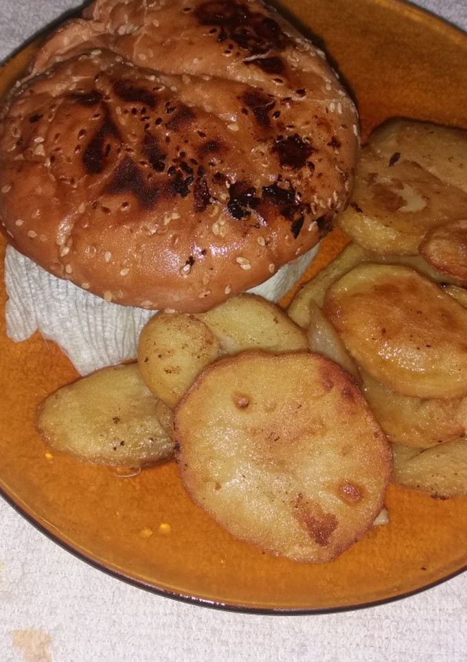 Una foto de Hamburguesa con cebolla caramelizada