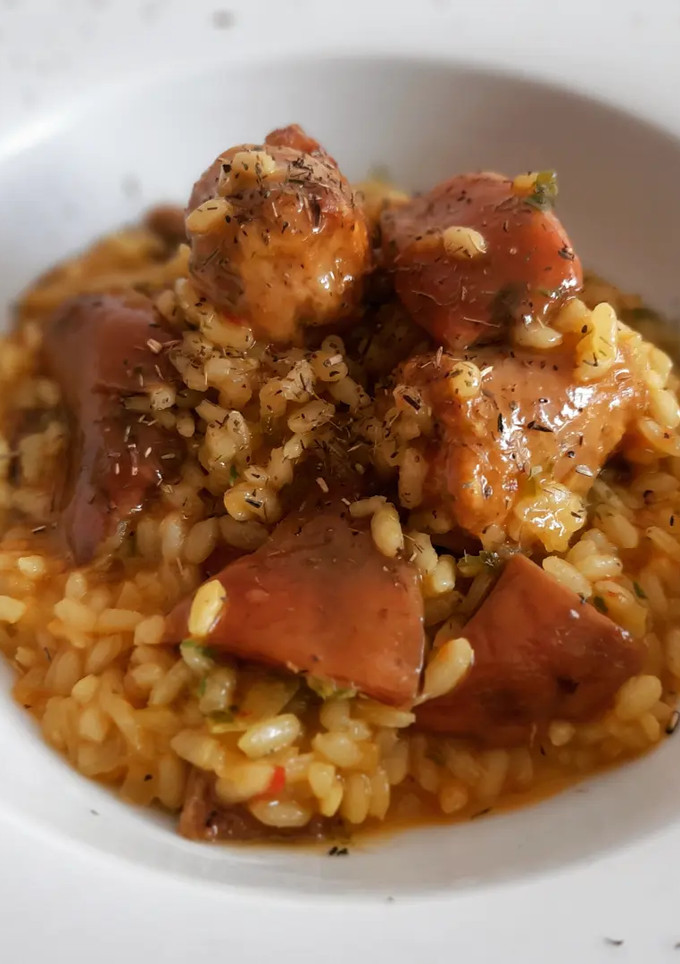 Una foto de Arroz meloso de níscalos y butifarra