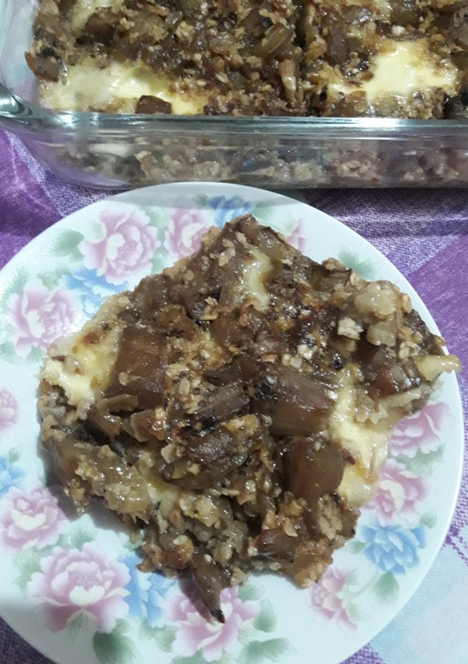 Una foto de Berenjenas con queso