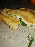 Omelette relleno de queso y ciboulette