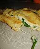 Omelette relleno de queso y ciboulette