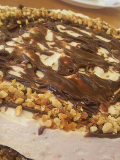 Una foto de Chessecake de dulce de leche y chips de chocolate