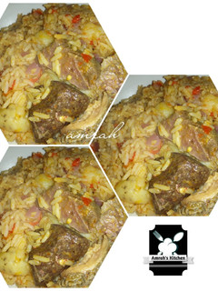 A picture of Jollof rice with irish potato.