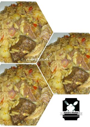 A picture of Jollof rice with irish potato.