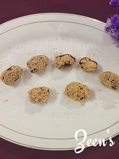 A picture of Poppy Seeds covered Dates.