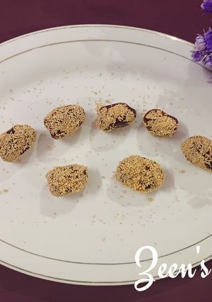 A picture of Poppy Seeds covered Dates.