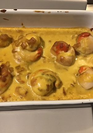 Une photo de Noix de saint Jacques à la crème de curry et échalotes