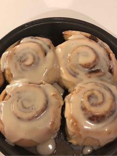 A picture of Cinnamon rolls with creamy frosting.