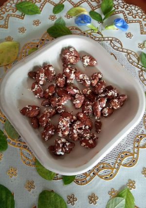 A picture of Chocolate coated dry fruits.